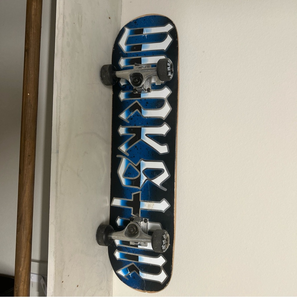 Blue and White Skateboard